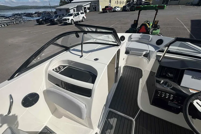 Slide: The Image of 2026 Bayliner VR6 Bowrider I/O interior with sleek design and modern dashboard. - 5