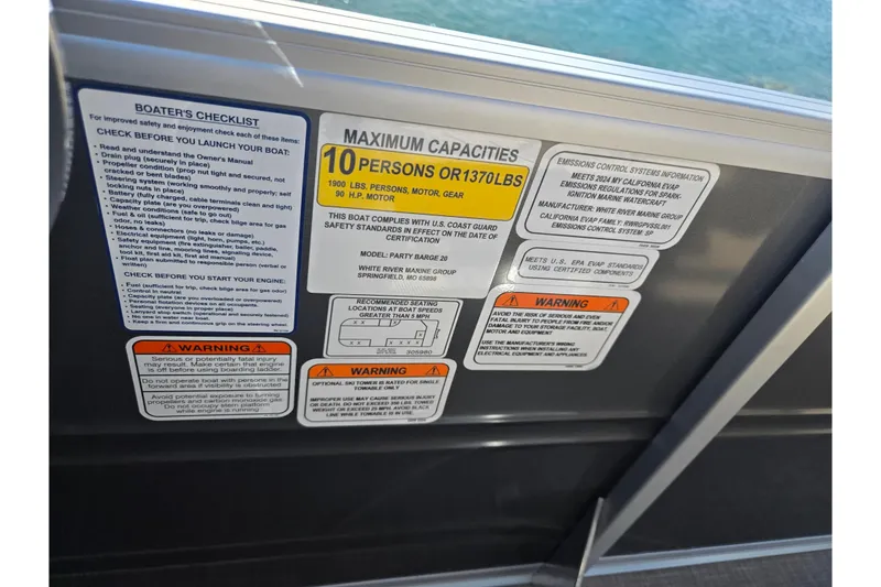 Slide: The Image of Safety and capacity labels on 2024 Sun Tracker Party Barge 20 DLX pontoon boat. - 16
