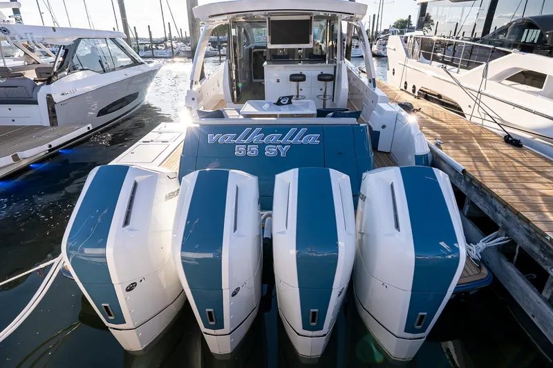 Slide: The Image of 2026 Valhalla V-55 Sport Yacht with quad engines docked at marina. - 10