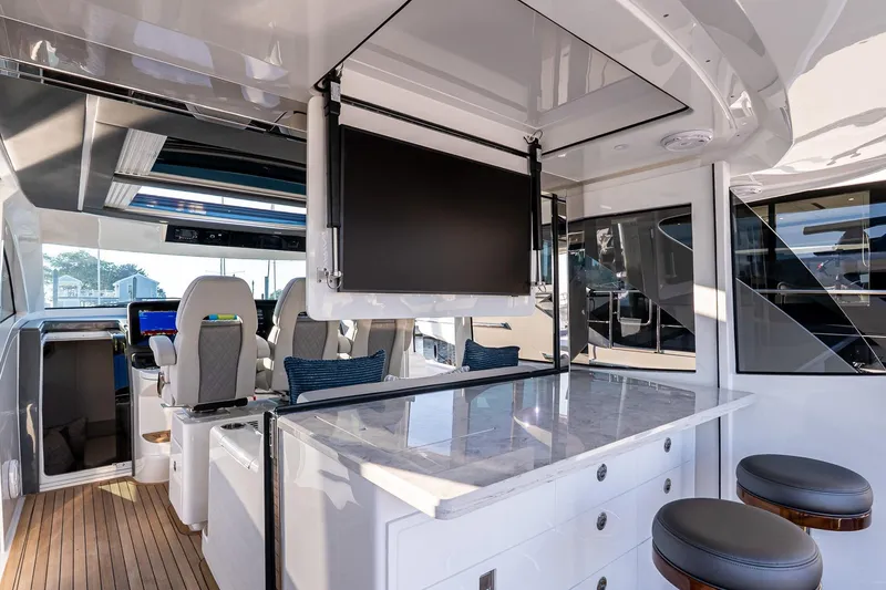 Slide: The Image of Luxurious interior of 2026 Valhalla V-55 Sport Yacht with modern seating and entertainment system. - 17