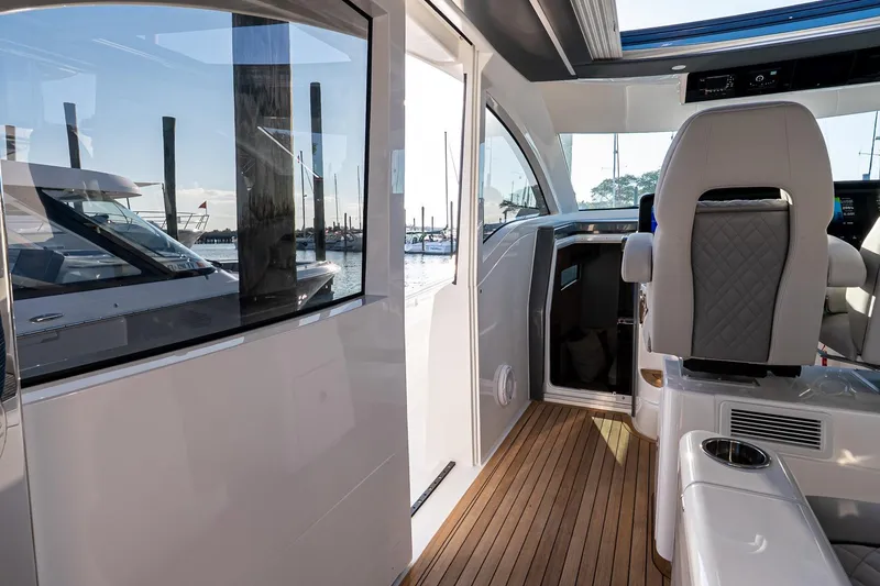 Slide: The Image of Interior view of 2026 Valhalla V-55 Sport Yacht, featuring sleek design and luxurious seating. - 24