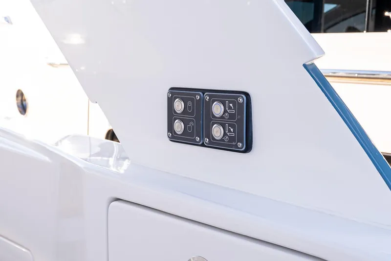 Slide: The Image of Control panel on 2026 Valhalla Boatworks V-55 Sport Yacht, featuring sleek white design. - 26