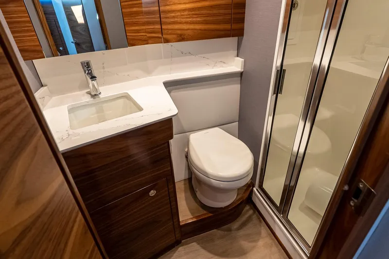 Slide: The Image of Luxurious bathroom in 2026 Valhalla V-55 Sport Yacht with modern fixtures and wood accents. - 37