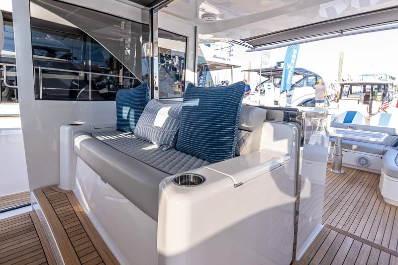 Slide: The Image of Luxurious seating area on 2026 Valhalla V-55 Sport Yacht with plush cushions. - 19