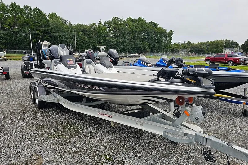 Slide: The Image of 2018 Phoenix 921 ProXP bass boat on trailer, parked outdoors. - 1