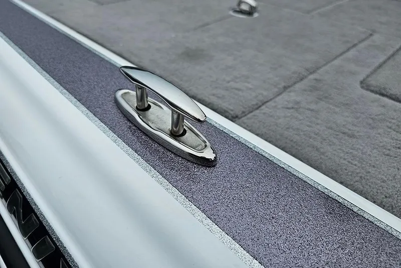Slide: The Image of 2018 Phoenix 921 ProXP boat cleat on textured deck surface. - 17
