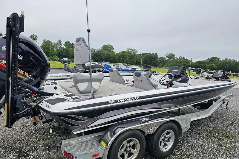 Slide: The Image of 2018 Phoenix 921 ProXP bass boat on trailer, parked outdoors. - 2