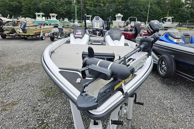 Slide: The Image of 2018 Phoenix 921 ProXP bass boat with trolling motor in a boatyard. - 3