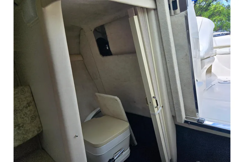 Slide: The Image of Interior cabin of 2002 Sea Ray 225 Weekender boat with compact toilet. - 16