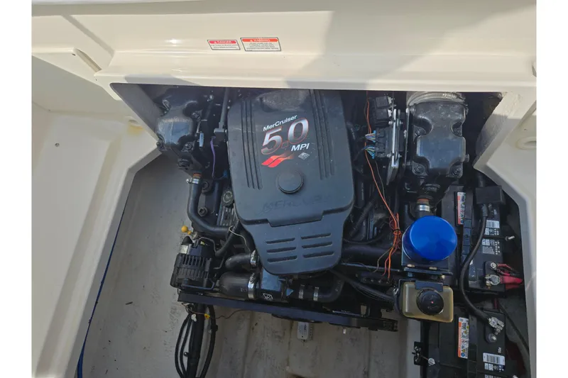 Slide: The Image of Engine compartment of a 2002 Sea Ray 225 Weekender with MerCruiser 5.0 MPI engine. - 21