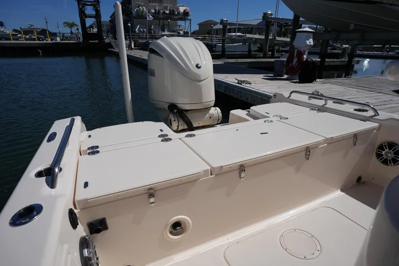 Slide: The Image of 2024 Grady-White 251 Coastal Explorer boat at dock with Yamaha outboard engine. - 20