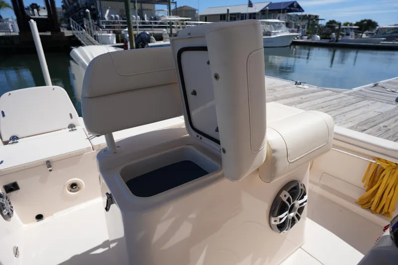 Slide: The Image of 2024 Grady-White 251 Coastal Explorer boat interior with open storage compartment. - 24