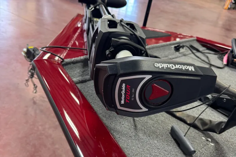 Slide: The Image of MotorGuide Tour motor on 2021 Bass Tracker Pro Team 195 boat, red finish. - 5