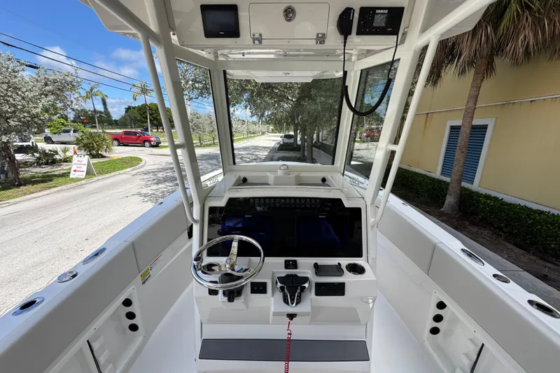Slide: The Image of 2026 Sailfish 252 boat cockpit with modern steering and control panel. - 10