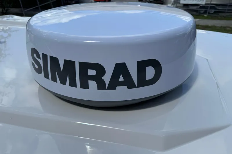 Slide: The Image of Simrad radar on 2026 Sailfish 252 boat, close-up view. - 22