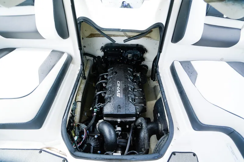 Slide: The Image of 2023 Yamaha Boats SX195 engine compartment with sleek design and advanced technology. - 18
