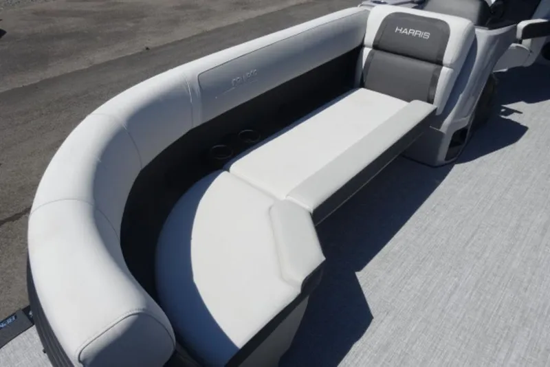 Slide: The Image of 2026 Harris Cruiser 230 Heritage boat interior with sleek, modern seating design. - 5