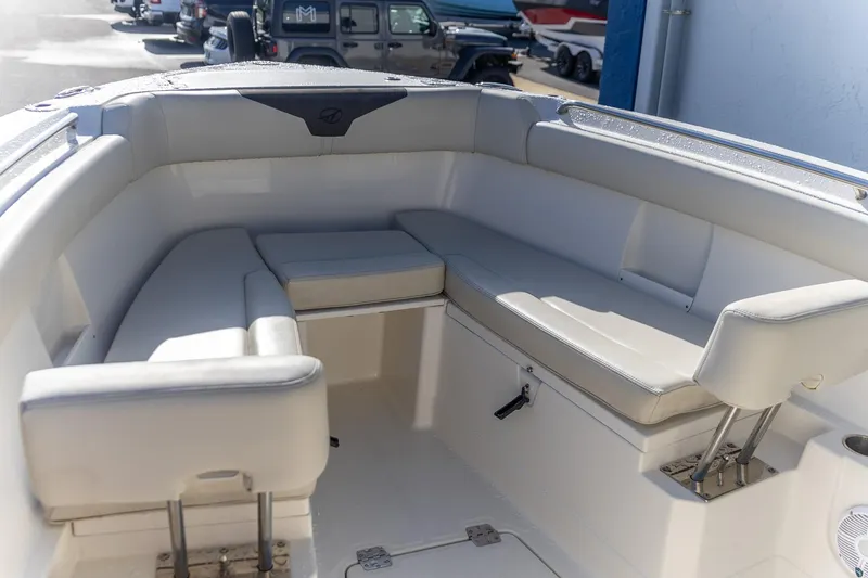 Slide: The Image of 2022 Sailfish 272 CC boat with dual Yamaha engines on a trailer. - 13