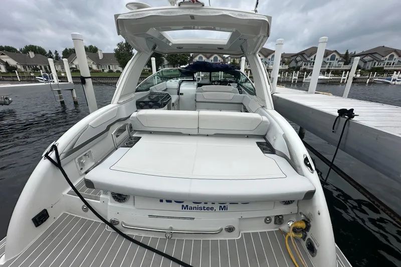 Slide: The Image of 2021 Formula 350 Sun Sport boat docked in Manistee, Michigan marina. - 11