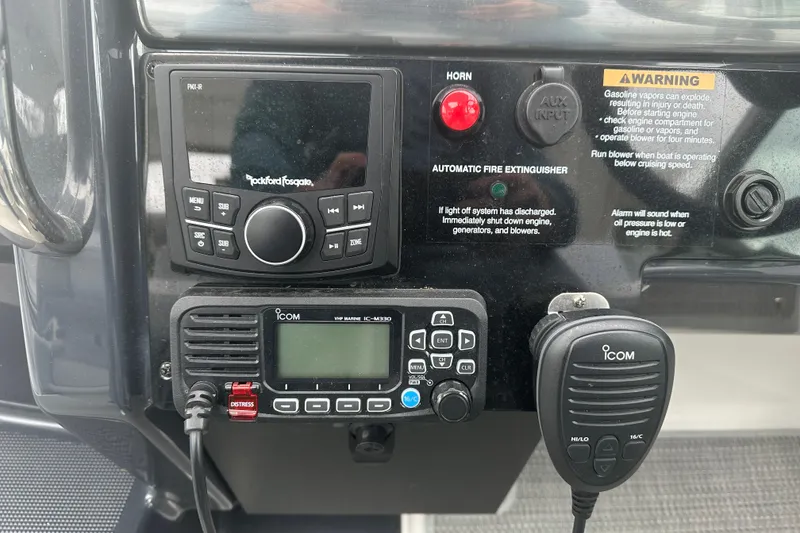 Slide: The Image of Control panel of 2021 Formula 350 Sun Sport with radio and safety features. - 21