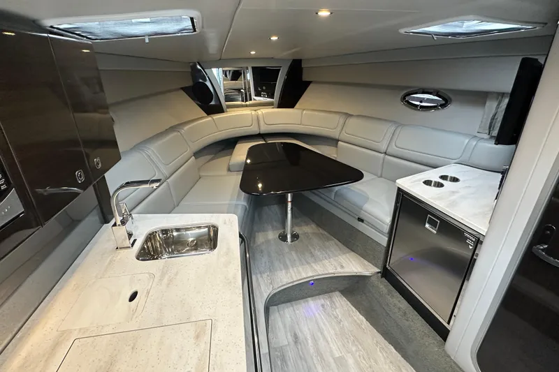 Slide: The Image of Luxurious interior of 2021 Formula 350 Sun Sport yacht with modern seating and kitchenette. - 30