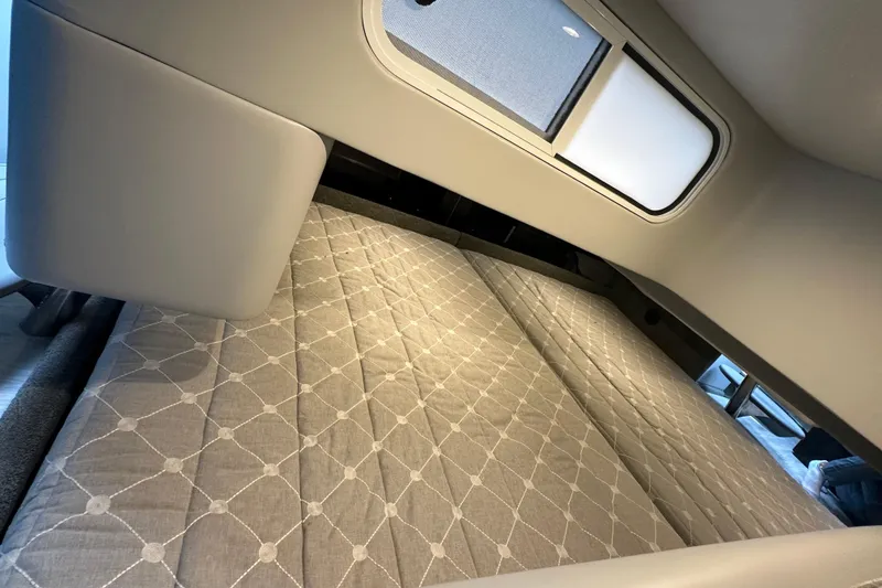 Slide: The Image of Interior cabin of 2021 Formula 350 Sun Sport with a comfortable bed and window. - 39