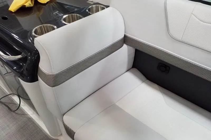 Slide: The Image of 2021 Formula 350 Sun Sport interior seating with cup holders and sleek design. - 42