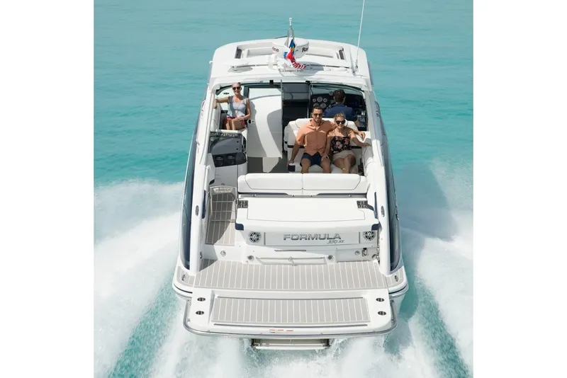 Slide: The Image of Manufacturer Provided Image: 2021 Formula 350 Sun Sport cruising on turquoise waters with passengers. - 56