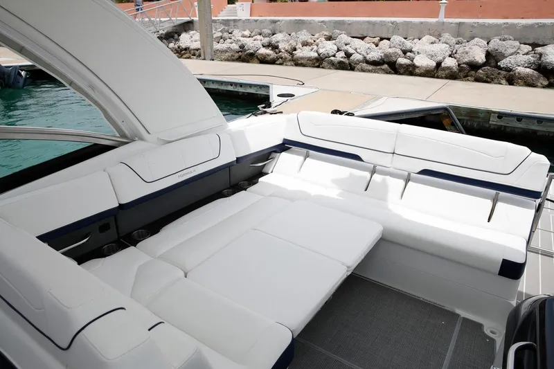 Slide: The Image of Manufacturer Provided Image: 2021 Formula 350 Sun Sport boat with spacious white seating area. - 60