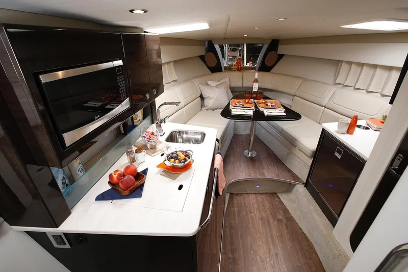 Slide: The Image of Manufacturer Provided Image: Interior of 2021 Formula 350 Sun Sport yacht with kitchen and dining area. - 63