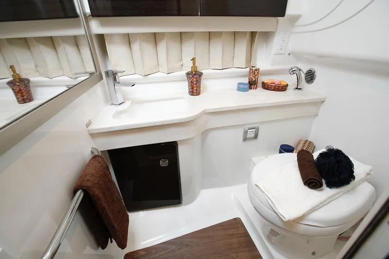 Slide: The Image of Manufacturer Provided Image: 2021 Formula 350 Sun Sport bathroom with modern fixtures and elegant decor. - 66