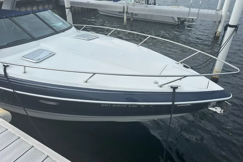 Slide: The Image of 2021 Formula 350 Sun Sport boat docked at marina, side view. - 70