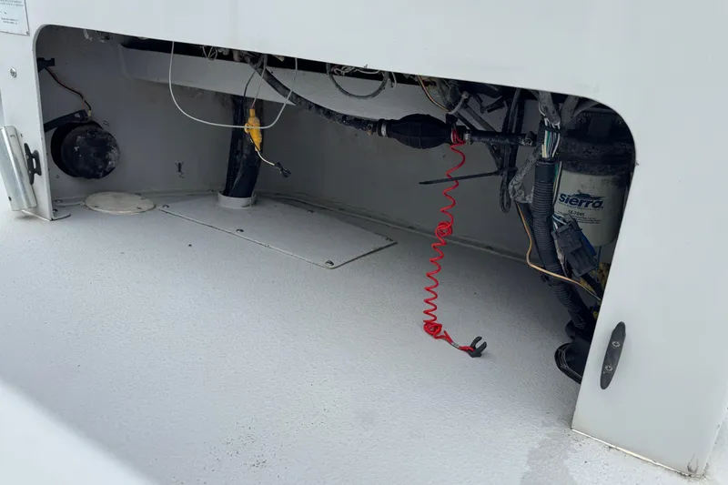 Slide: The Image of 2006 Majek 22 Extreme boat interior wiring and components view. - 14