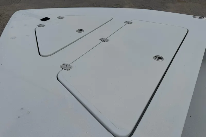 Slide: The Image of 2006 Majek 22 Extreme boat deck with storage compartments and hinges. - 5