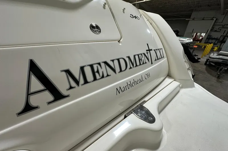 Slide: The Image of 2004 Sea Ray 340 Sundancer boat with "Amendment XXI" text, Marblehead, OH location. - 2