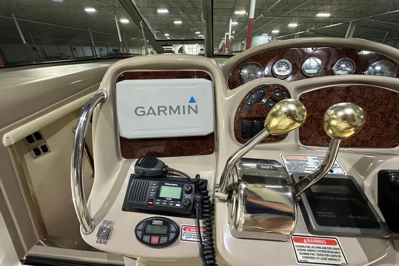 Slide: The Image of Control panel of a 2004 Sea Ray 340 Sundancer with Garmin navigation system. - 21