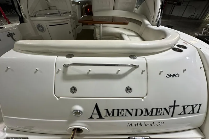 Slide: The Image of 2004 Sea Ray 340 Sundancer boat with "Amendment XXI" name, docked in Marblehead, OH. - 3