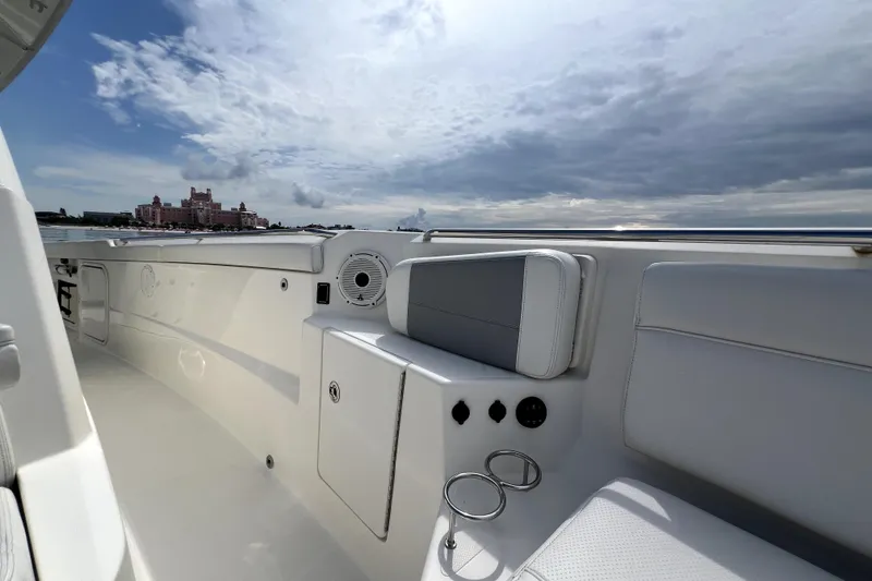 Slide: The Image of 2020 Pursuit S 328 Sport boat interior with scenic waterfront view. - 23