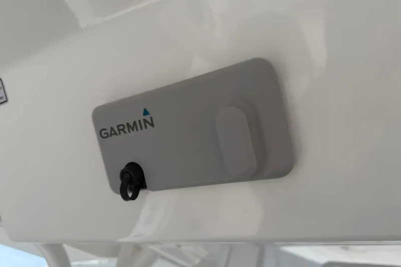 Slide: The Image of Garmin device mounted on 2026 Regulator 37 boat interior. - 24