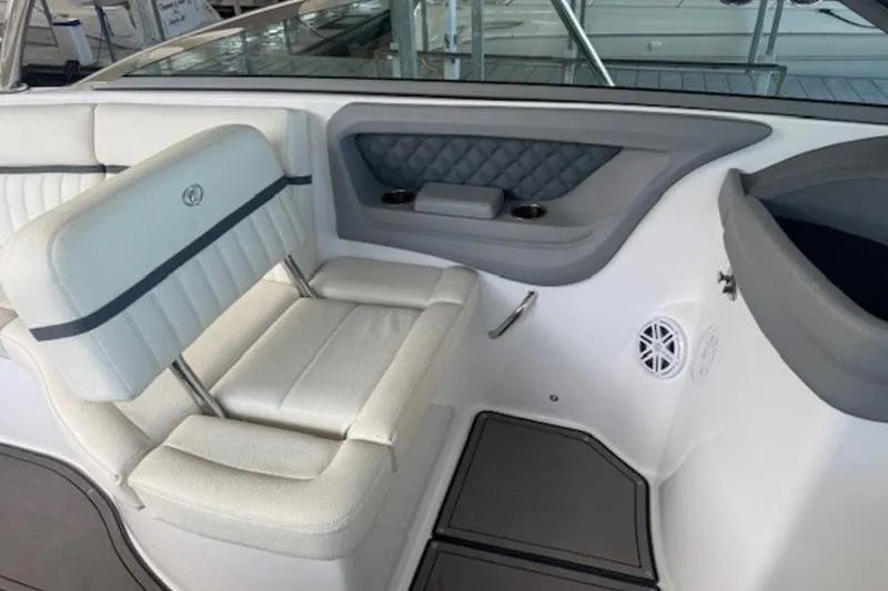 Slide: The Image of Interior of 2017 Cobalt R35 boat with white leather seating and gray accents. - 14