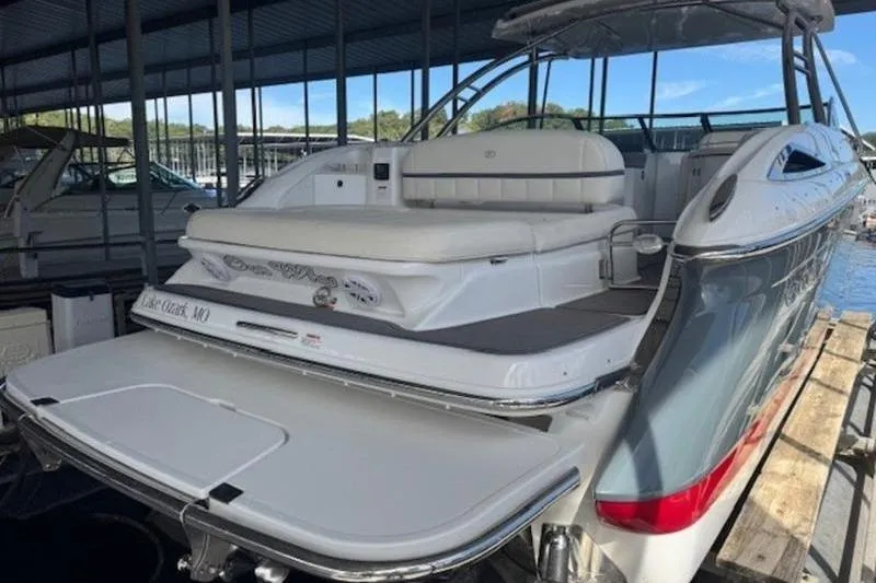 Slide: The Image of 2017 Cobalt R35 boat docked, featuring spacious seating and sleek design. - 3