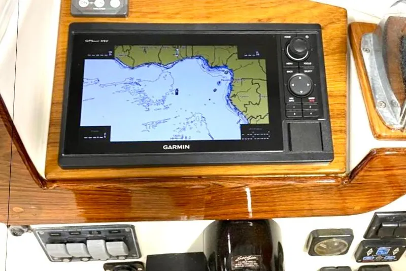 Slide: The Image of Garmin GPS display on 2003 Dyer 29 Soft Top boat dashboard. - 5