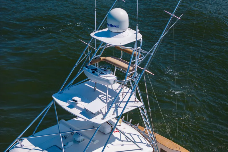 Slide: The Image of Aerial view of 2012 Cabo 44 Hardtop Express boat tower on water. - 42