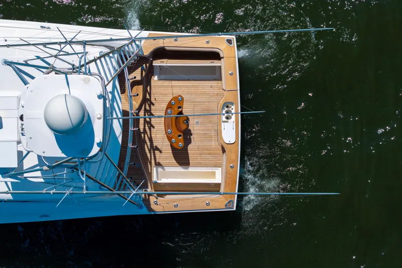 Slide: The Image of Overhead view of 2012 Cabo 44 Hardtop Express yacht on water. - 56