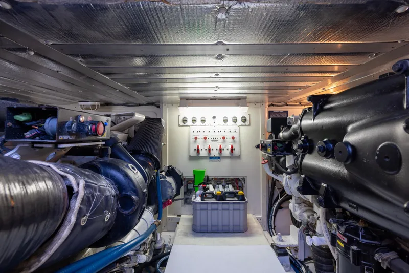 Slide: The Image of 2012 Cabo 44 Hardtop Express yacht on water, clear sky, rear view. - 61