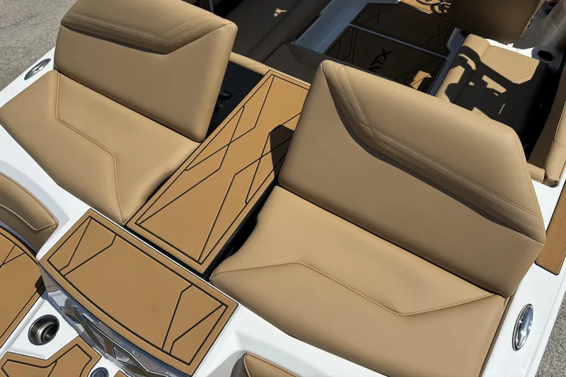 Slide: The Image of 2026 ATX Surf Boats 22 Type-S interior with tan seating and stylish design. - 10