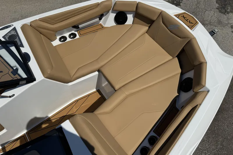 Slide: The Image of 2026 ATX Surf Boats 22 Type-S interior with tan seating and modern design. - 11