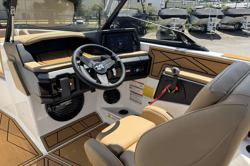 Slide: The Image of 2026 ATX Surf Boats 22 Type-S interior with modern dashboard and steering wheel. - 12