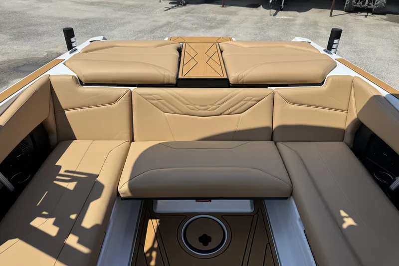 Slide: The Image of 2026 ATX Surf Boats 22 Type-S interior with tan leather seating and modern design. - 9