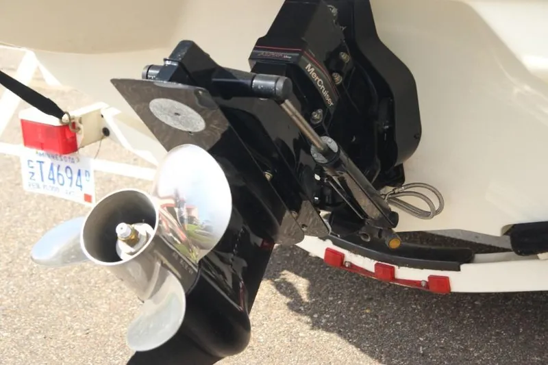 Slide: The Image of 2006 Sea Ray 205 Sport boat with MerCruiser outdrive and propeller detail. - 12